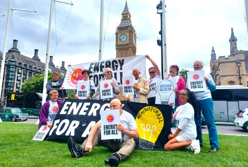 FPA members hold banners reading 'Energy For All' in front of Big Ben